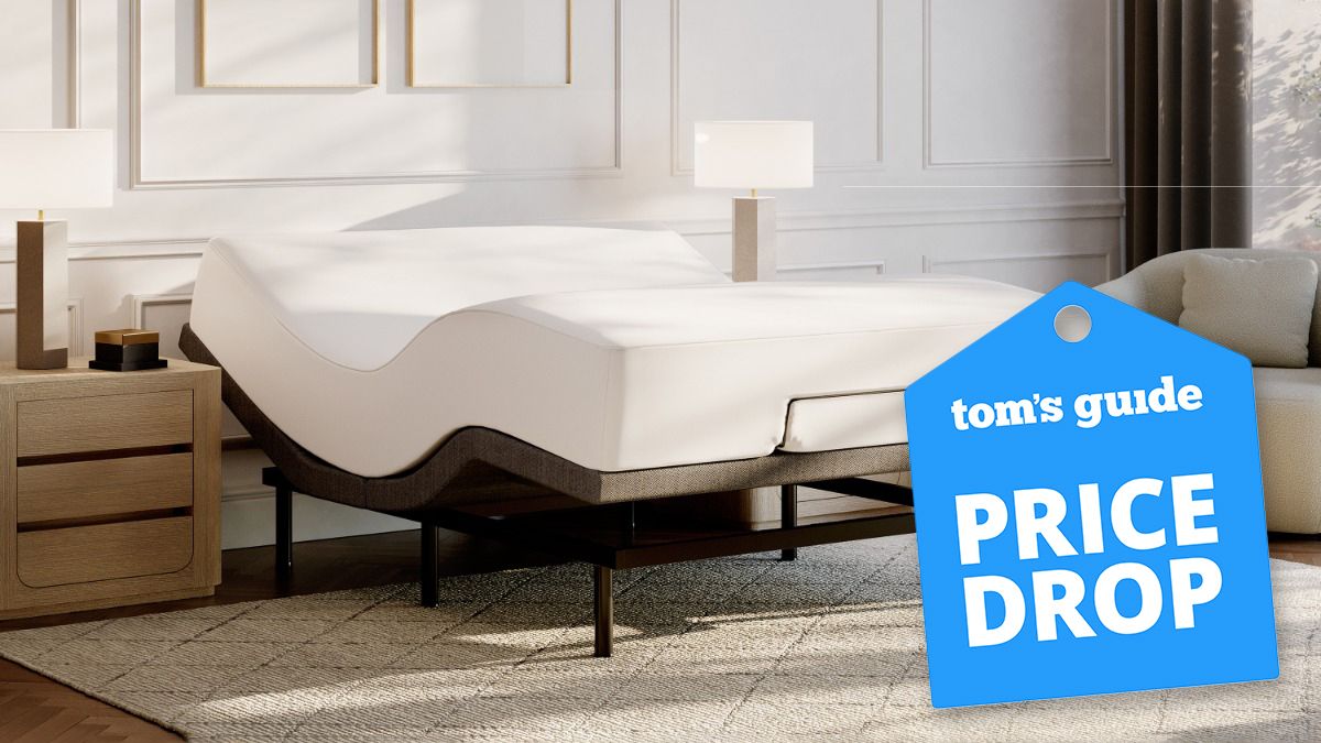 A DreamCloud Adjustable Bed Frame with a DreamCloud mattress on top, in a bedroom. A Tom&#039;s Guide price drop deals graphic (right)