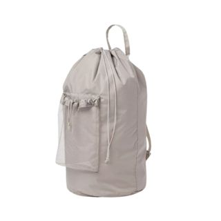 A gray laundry bag with handles and a mesh pocket