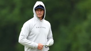 Golfers in hoodie