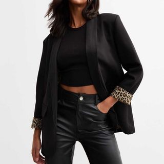 black blazer with leopard print cuffs