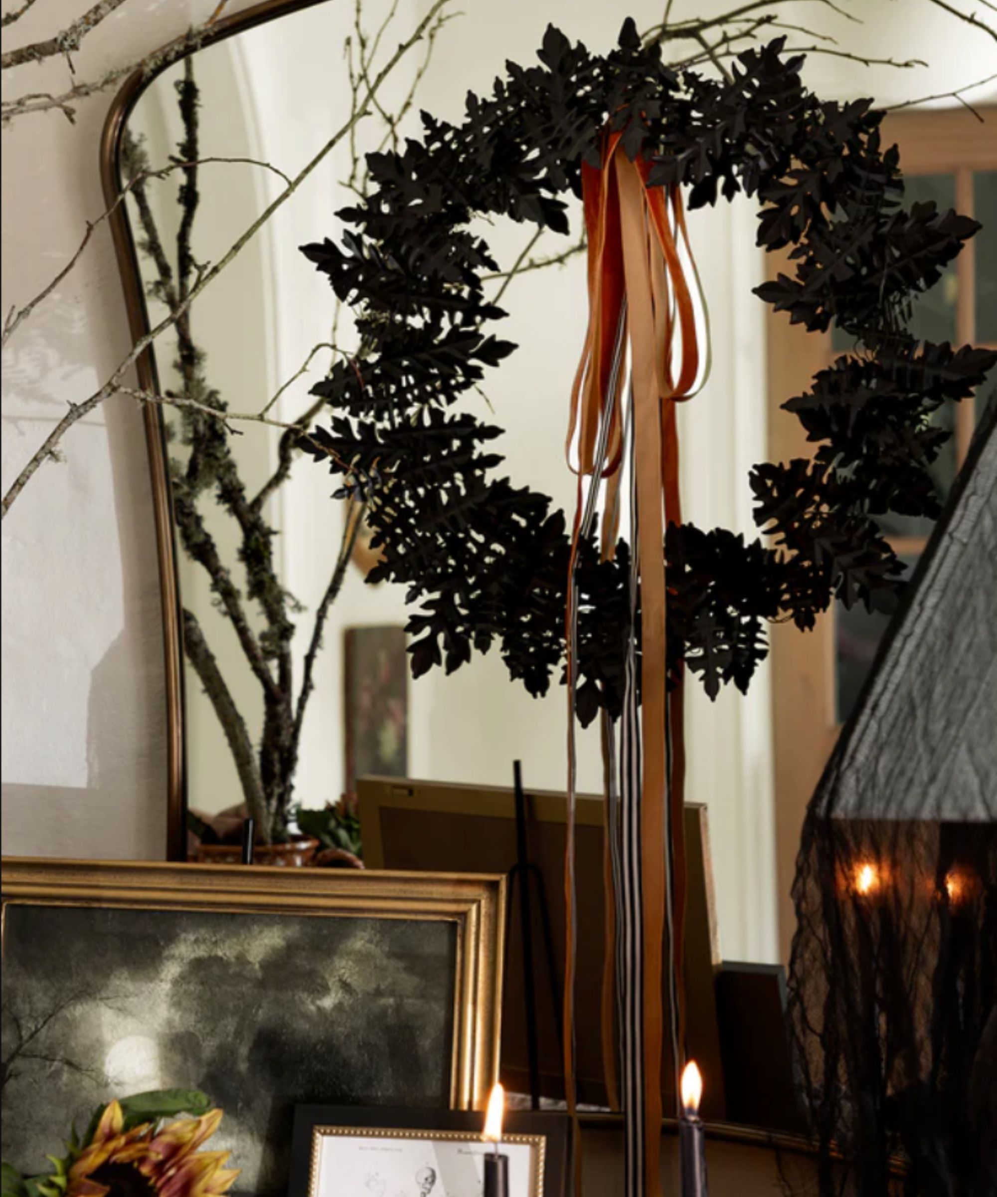 dark halloween wreath on a mirror
