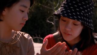 Im Soo-jung and Moon Su-yeon sharing a moment in A Tale of Two Sisters