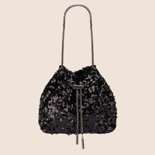 flat lay image of a black sequin handbag