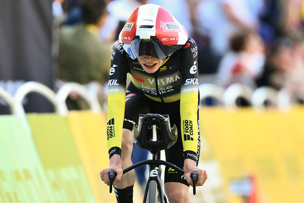 Team Visma - Lease a bike team&#039;s Danish rider Jonas Vingegaard cycles to the finish line of the 5th stage of the 112th edition of the Tour de France cycling race, 33 km individual time trial starting and finishing in Caen, northwestern France, on July 9, 2025. (Photo by Marco BERTORELLO / AFP) (Photo by MARCO BERTORELLO/AFP via Getty Images)