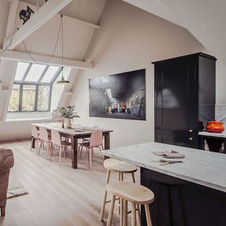 kitchen and dining room with wooden stool