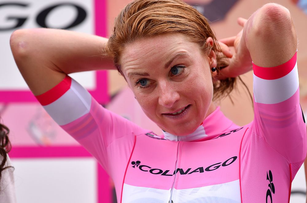 Annemiek Van Vleuten (Mitchelton-Scott) puts on the pink jersey at the Giro Rosa