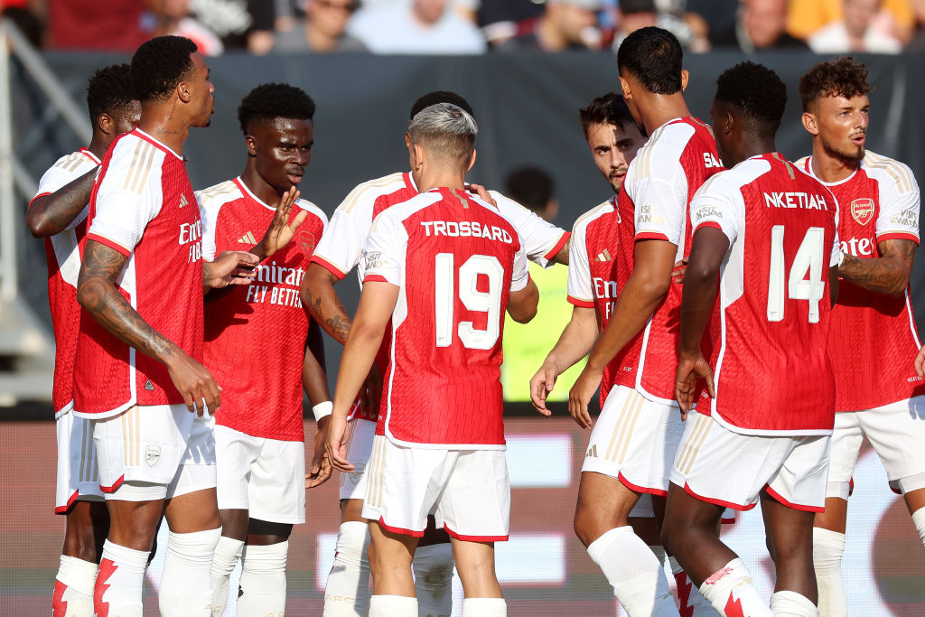 Bukayo Saka of Arsenal celebrates with team mates after scoring their sides first goal during the pre-season friendly match between 1. FC Nürnberg and Arsenal FC at Max-Morlock Stadion on July 13,