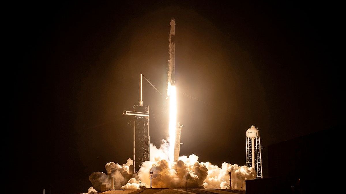 a rocket launches at night