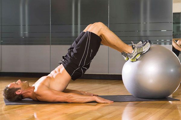 Gym ball hamstring curl