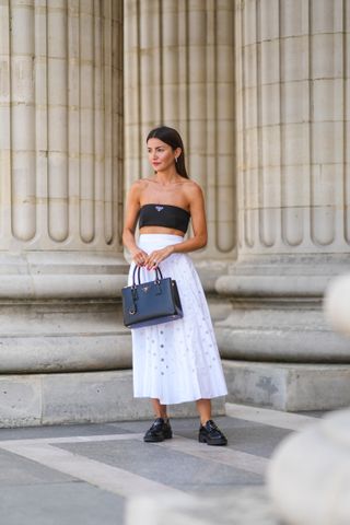 woman wearing tube top and skirt