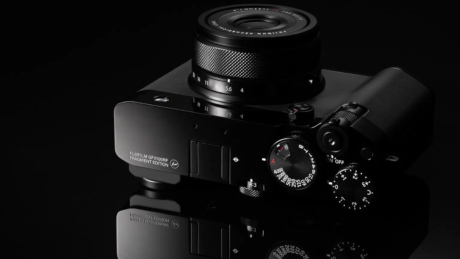 The Fujifilm GFX100RF Fragment Edition on a black background