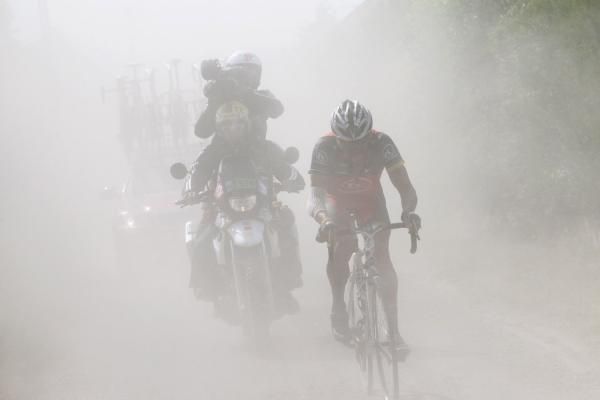 Lance Armstrong suffered a flat tyre, but it was nowhere near where Radioshack had people stationed with spares.