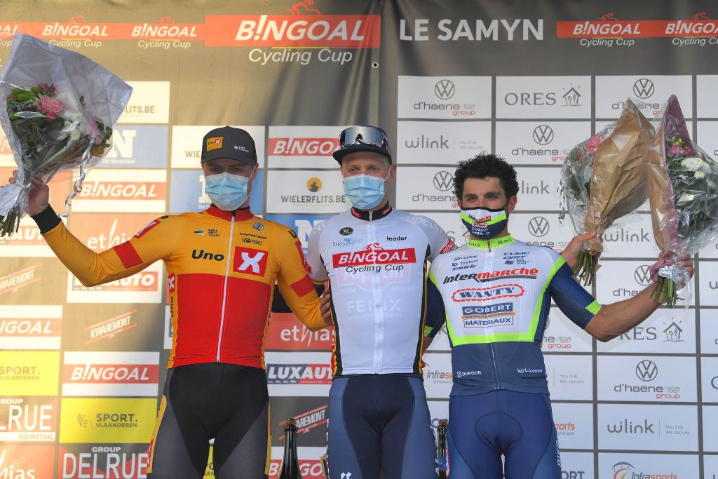 DOUR, BELGIUM - MARCH 02: Podium / Rasmus Tiller of Norway and Uno-X Pro Cycling Team, Tim Merlier of Belgium and Team Alpecin-Fenix &amp; Andrea Pasqualon of Italy and Team Intermarch&Acirc;-Wanty-Gobert Mat&Acirc;riaux Celebration, during the 53rd Grand Prix Le Samyn 2021, Men's Elite a 205,4km race from Quaregnon to Dour / Mask / Covid Safety Measures / @GPSamyn / on March 02, 2021 in Dour, Belgium. (Photo by Luc Claessen/Getty Images)