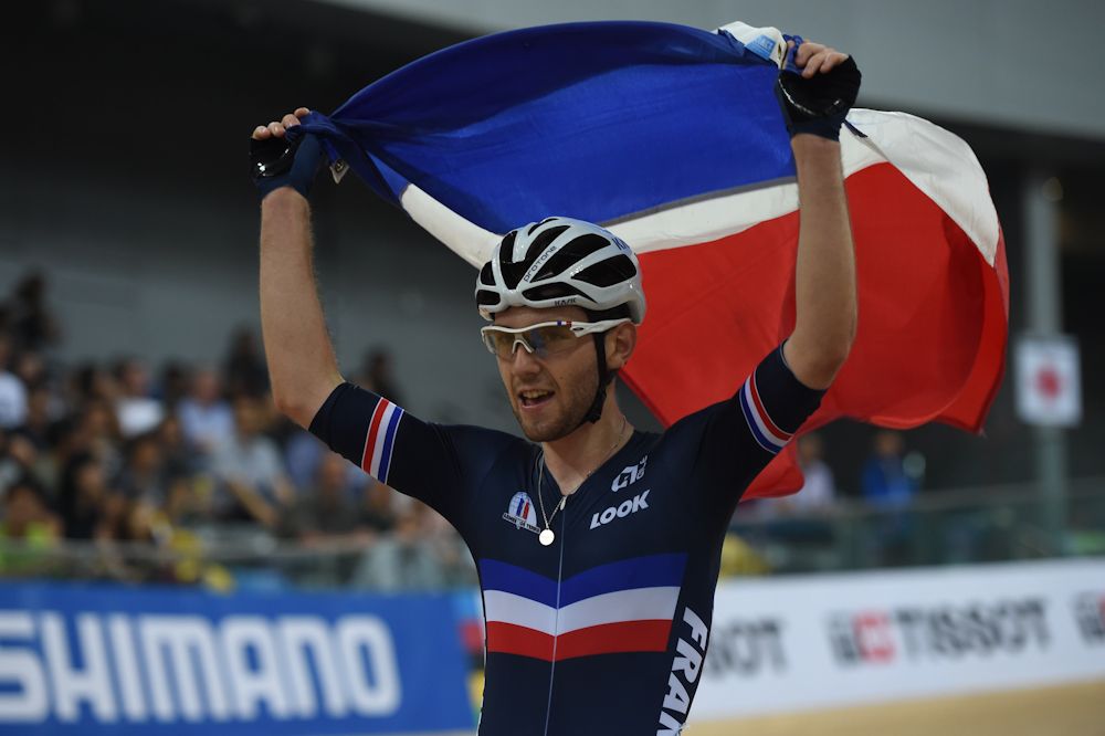 Benjamin Thomas of France celebrates after victory in the Men's Ominum Points Race