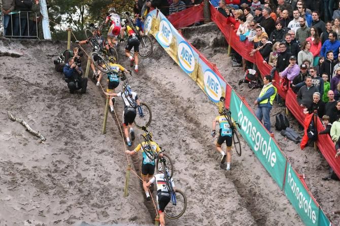 The rider running up the sand hill