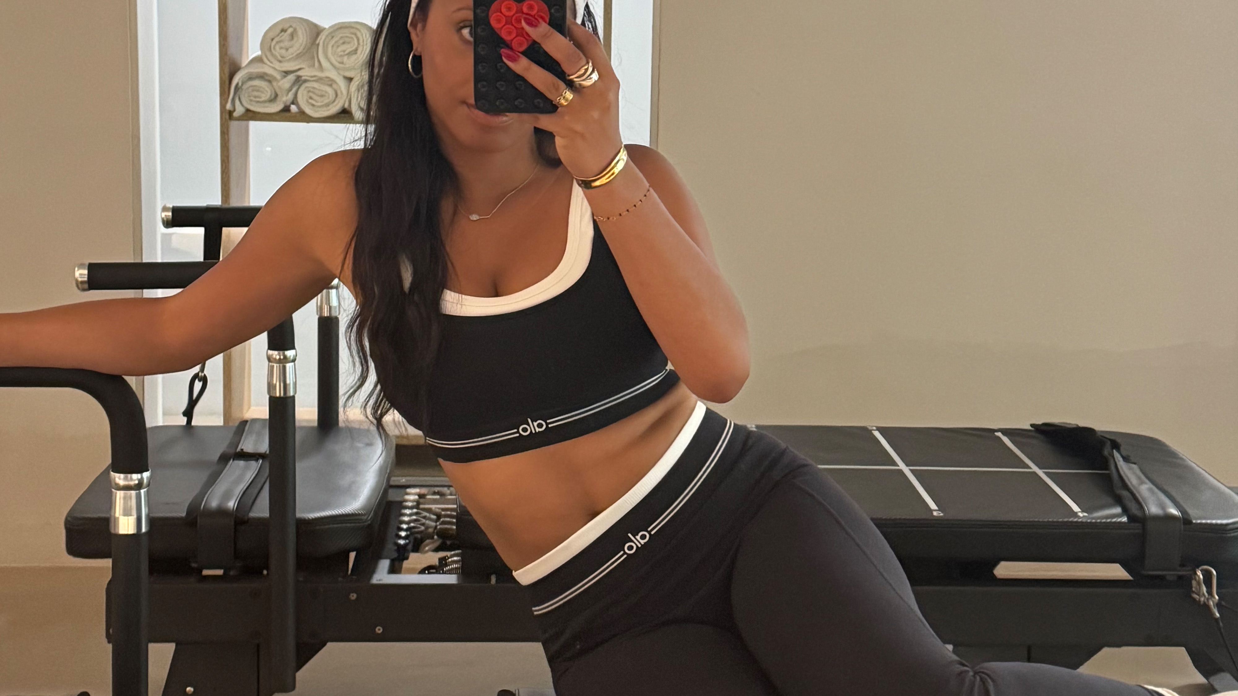 Sierra Mayhew wearing ALO activewear set.