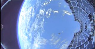 The view from a SpaceX rocket fairing as it falls to Earth.