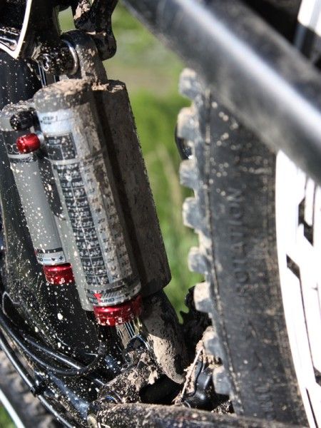 Though in the line of fire of debris coming off of the rear tire, a small guard is installed towards the bottom to help keep the shock clean.