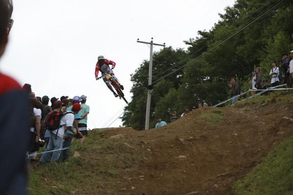 This jump, named Le planeur, propels the rider through the air just before the stone slab section. The intermediate time is taken at this section.