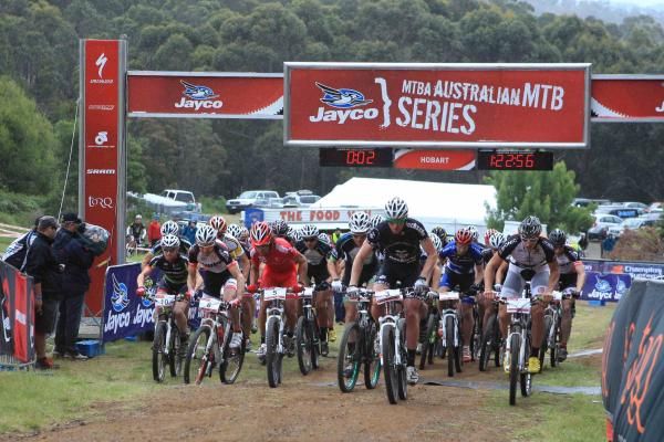 The start of the Australian MTB Series men's elite cross country race at Glenorchy MTB Park