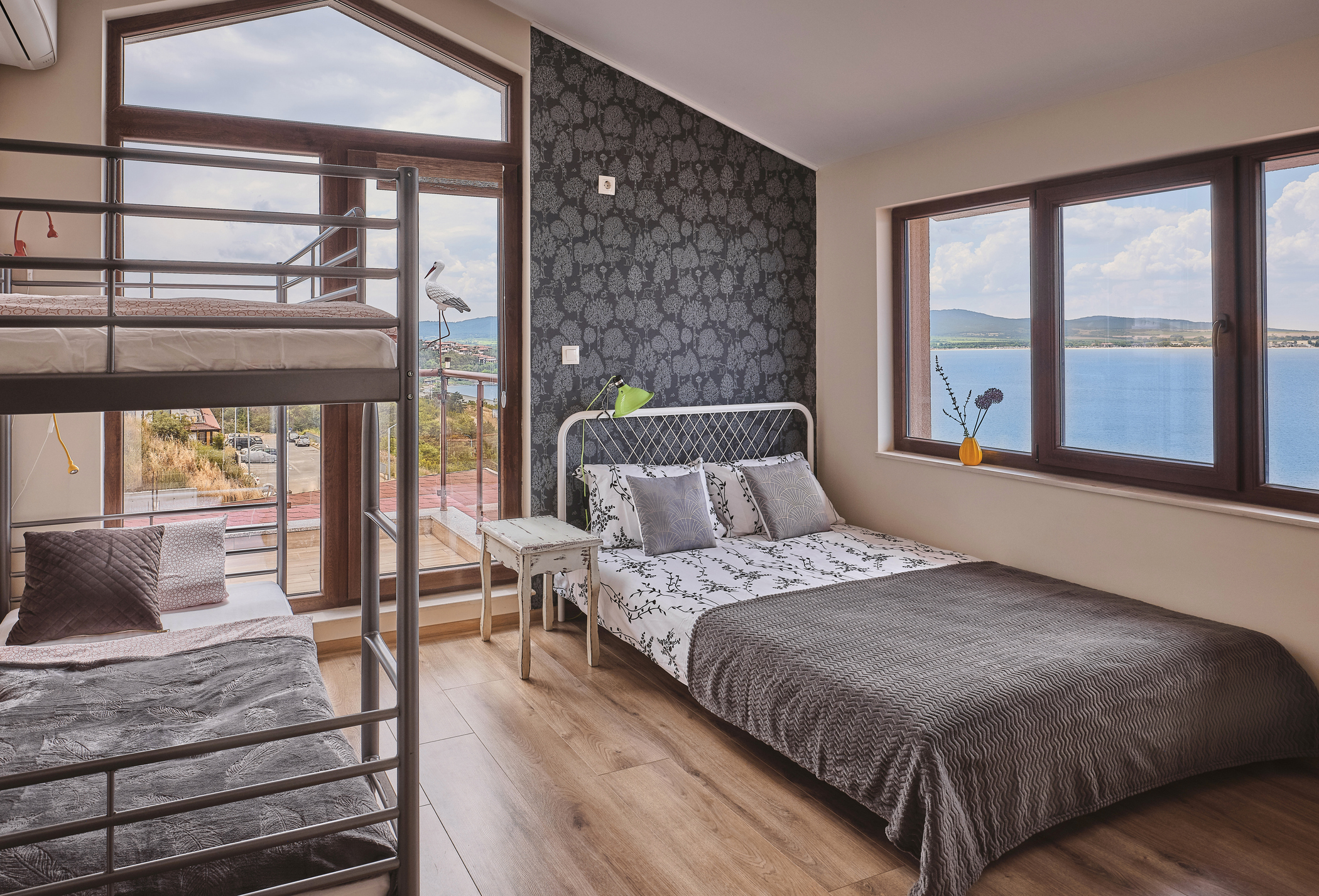 Guest room with bunk beds overlooking the ocean