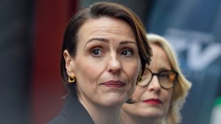 Suranne Jones and Julie Delpy look at something over their shoulders