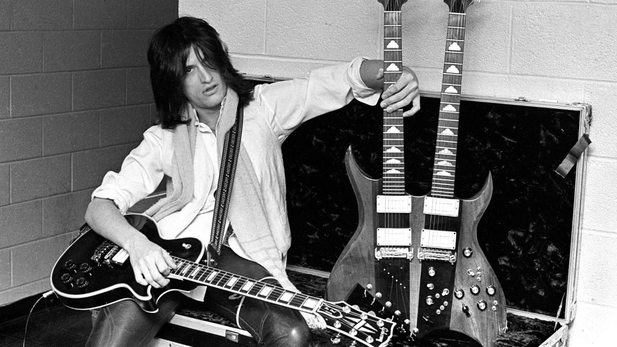Aerosmith guitarist Joe Perry with a Gibson guitar and a B.C.Rich doubleneck backstage at the Boston Garden on November 27, 1978 in Boston, Massachusetts
