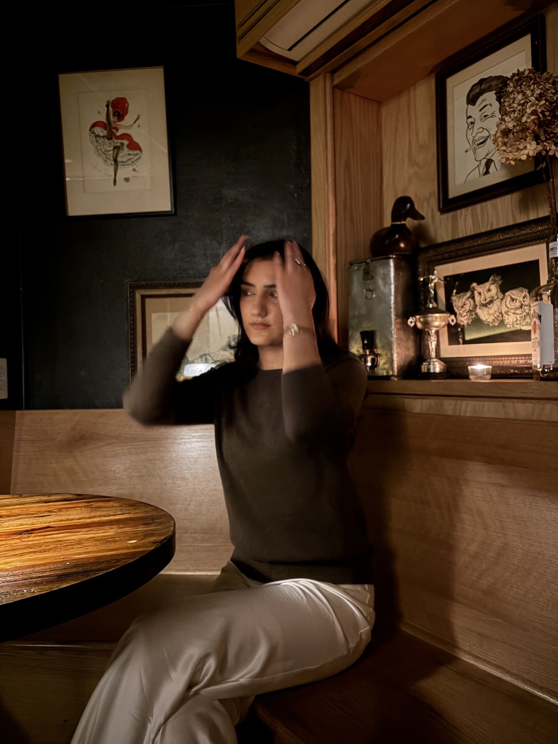 WWW assistant shopping editor wears the Quince Mongolian Cashmere crewneck in brown.