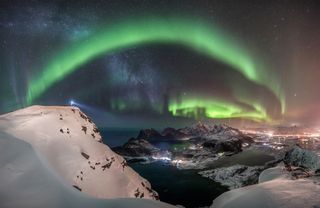 Nicholai Brügger hiked in the snow to the top of the mountain Offersøykammen in Norway to capture the aurora over the Lofoten Islands. He used a Nikon D600 camera with a 15mm f/2.8 lens, ISO 2000 and 12 x 13sec exposures.
