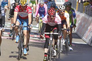 Cadel Evans (BMC), who started the day in the maglia rosa, crosses the finish line.