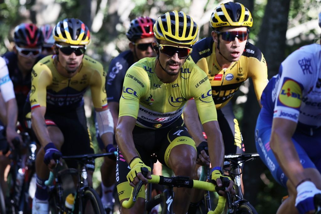 Team Deceuninck rider Frances Julian Alaphilippe C wearing the overall leaders yellow jersey rides during the 4th stage of the 107th edition of the Tour de France cycling race 157 km between Sisteron and OrcieresMerlette on September 1 2020 Photo by KENZO TRIBOUILLARD AFP Photo by KENZO TRIBOUILLARDAFP via Getty Images