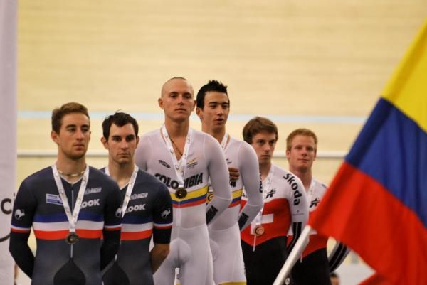 The men's Madison podium: France, Colombia and Switzerland