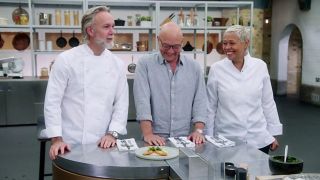 Host Gregg Wallace (centre) shares a laugh with judges Marcus Wareing (left) and Monica Galetti (right) in MasterChef: The Professionals season 17