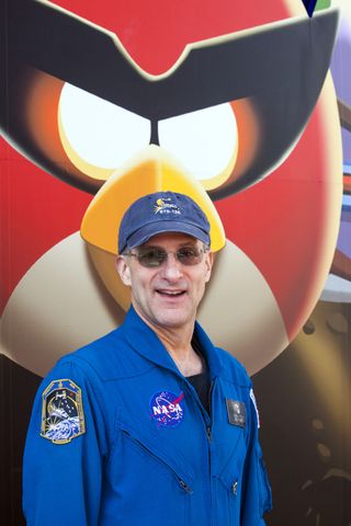 Don Pettit at Angry Birds Space Encounter Exhibit Entrance