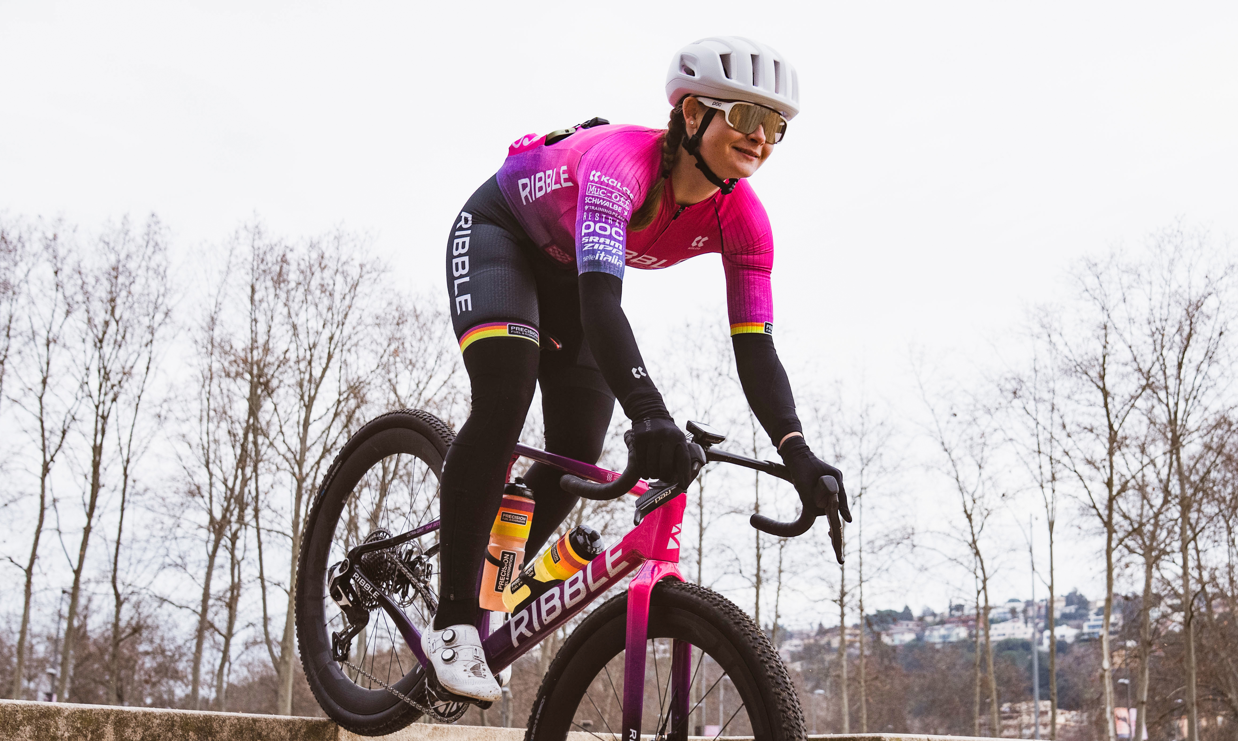 Abi Smith riding a gravel bike