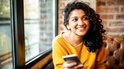 photo of 20-year-old with mobile phone