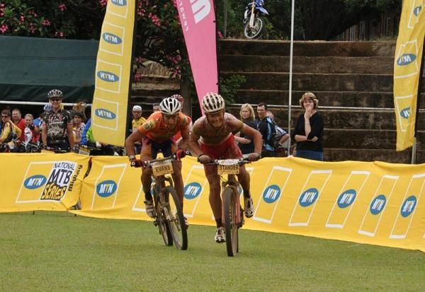 The sprint for second between Burry Stander and Kevin Evans.