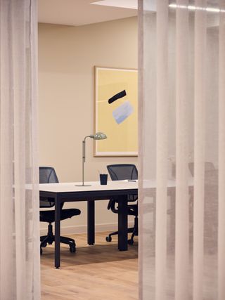 Meeting room behind white curtain