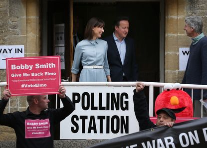 British Prime Minister David Cameron votes in election that could unseat him