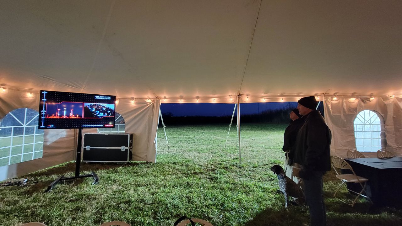 Storm the security dog inside the NASA Wallops Flight Facility media tent watching Rocket Lab's launch.