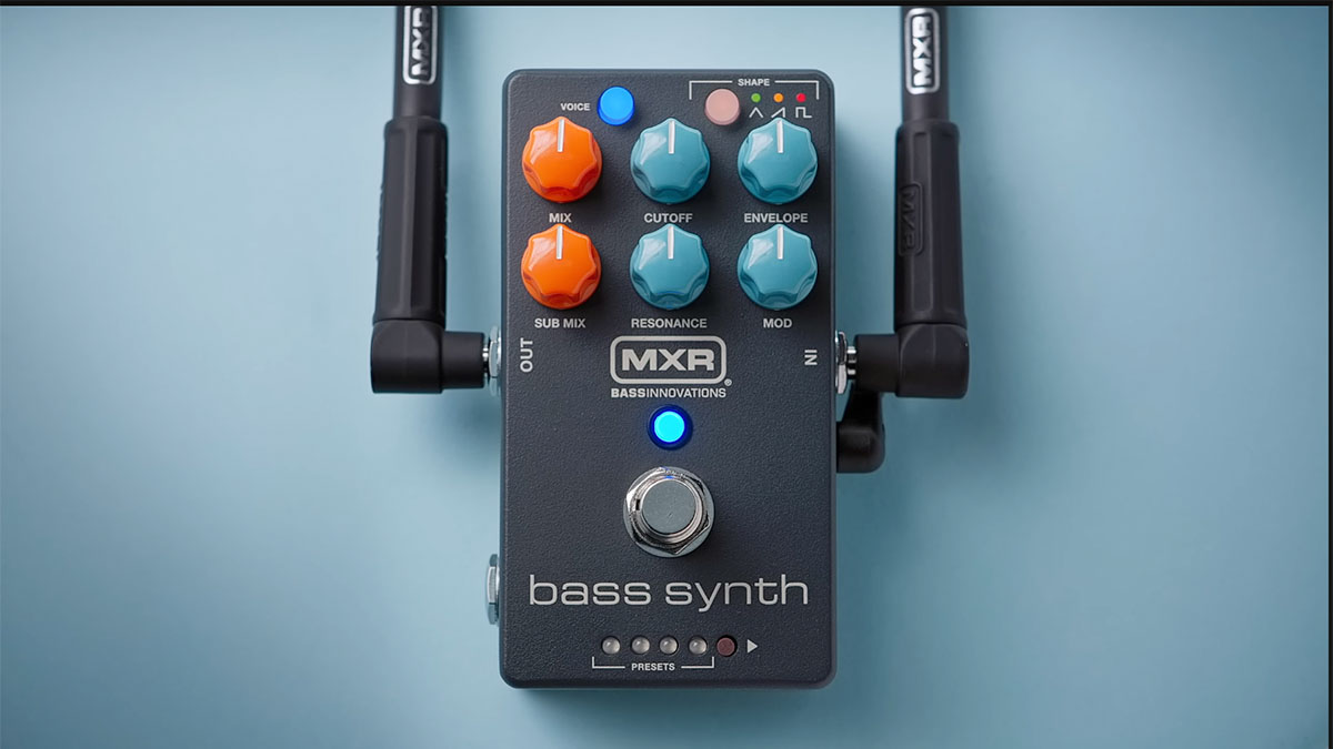 MXR MB301 Bass Synth: the six-knob pedal is pictured in use against a petrol-blue background.