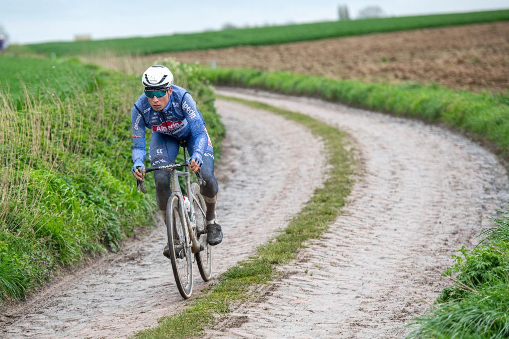 Belgian Jasper Philipsen of Alpecin-Deceuninck pictured in action during the reconnaissance of the track ahead of this year's Paris-Roubaix cycling race, Friday 05 April 2024, around Roubaix, France. The Paris-Roubaix cycling races will take place this weekend, with the women riding on Saturday and the men on Sunday. BELGA PHOTO JONAS ROOSENS (Photo by JONAS ROOSENS / BELGA MAG / Belga via AFP)