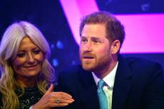 Prince Harry was comforted by co-host Gaby Roslin.