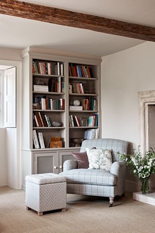 Bookshelf, blue armchair