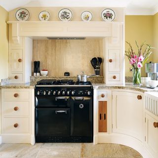 kitchen room with black dual fuel range cooker
