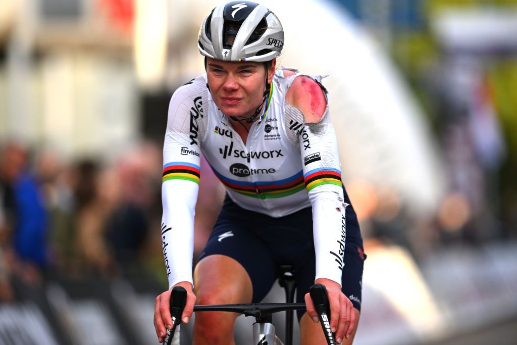 DOETINCHEM NETHERLANDS OCTOBER 12 Lotte Kopecky of Belgium and Team SD Worx Protime crosses the finish line injured after being involved in a crash during the 26th Simac Ladies Tour 2024 Stage 5 a 140km stage from Doetinchem to Doetinchem UCIWWT on October 12 2024 in Doetinchem Netherlands Photo by Luc ClaessenGetty Images