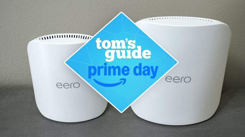 Eero Pro 7 and Eero Max 7 on a desk with a Tom&#039;s Guide Prime Day deals badge