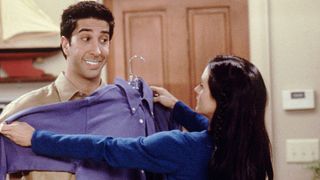 Ross (David Schwimmer) and Monica Geller (Courteney Cox) test shirt choices against Ross' bright white teeth