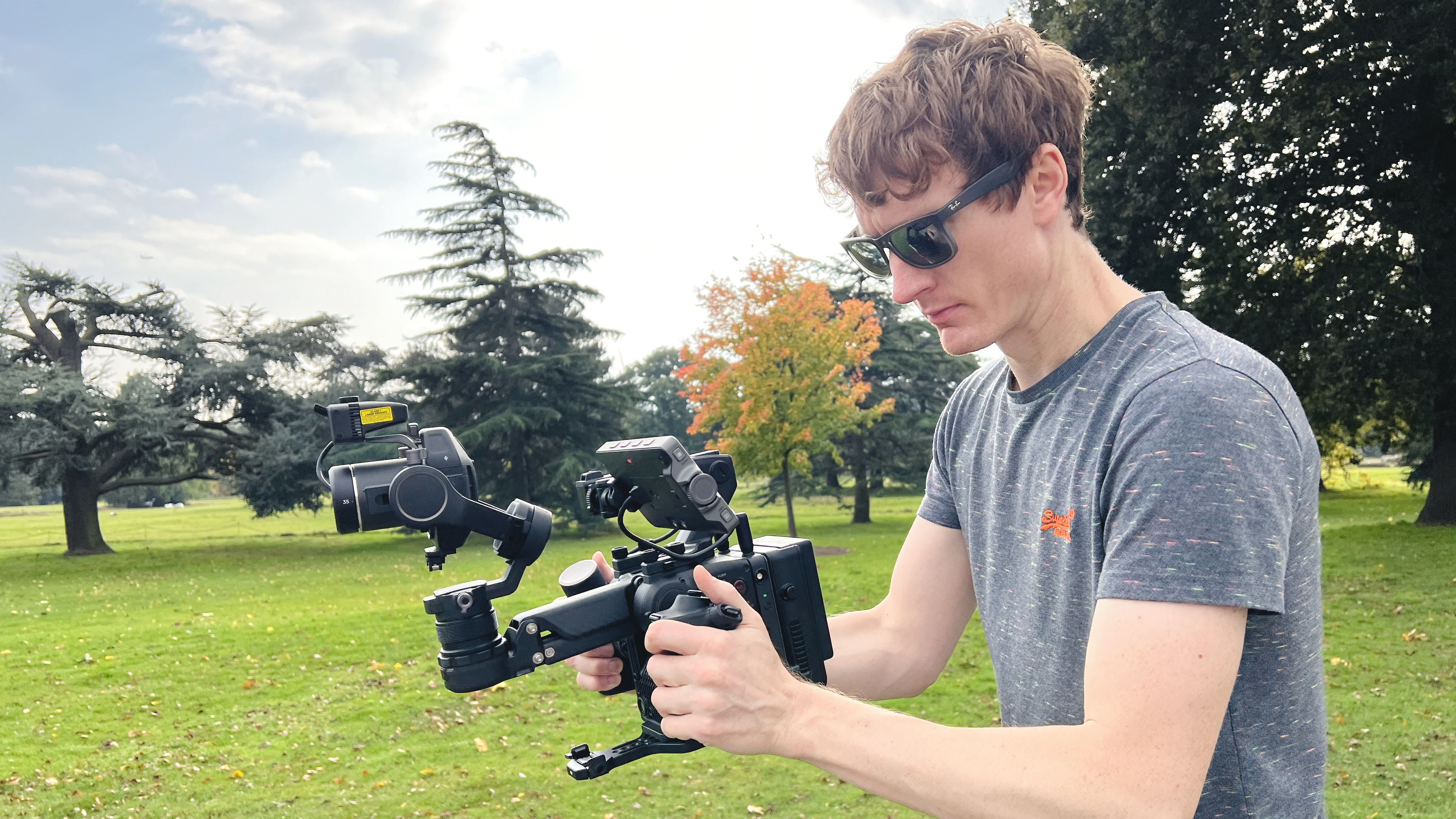 The DJI Ronin 4D being held by a filmmaker