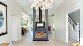 double sided fireplace in open plan living room